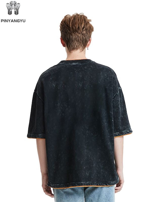 T-Shirt mit Distressed-Waschung und Patchwork-Design